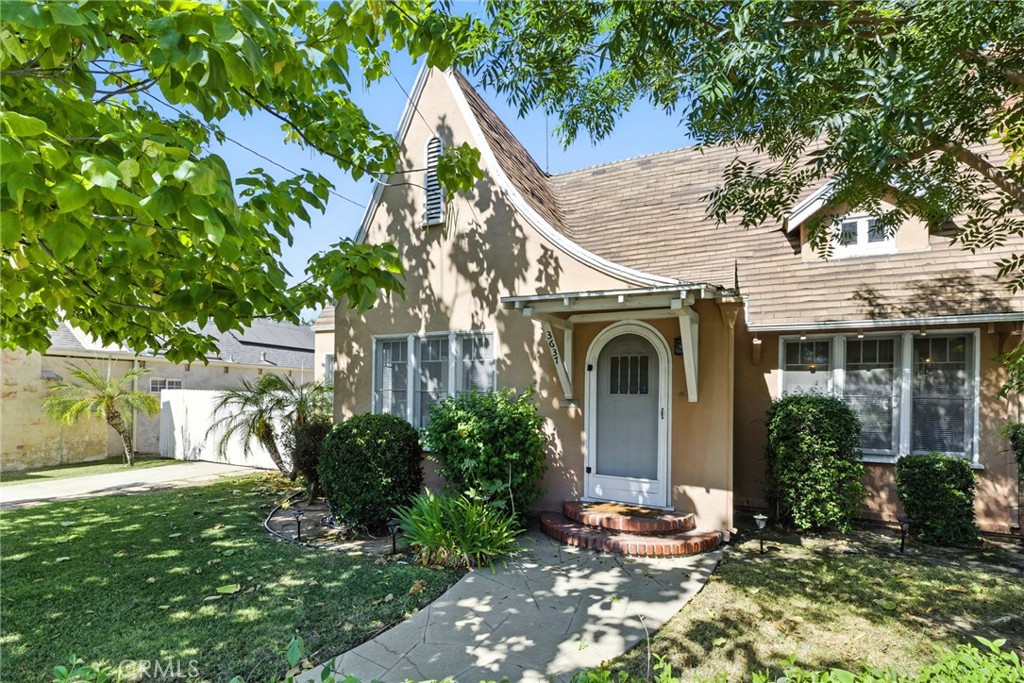 |WOOD STREETS| For the first time in over 50 years, 3637 Jurupa Avenue is on the market—a beautiful 1928 Tudor Revival home located in Riverside’s beloved Wood Streets historic neighborhood. This single-story treasure offers 1,449 sq ft of living space with 3 bedrooms and 1 full bathroom, and is filled with vintage charm and timeless character. Step through the arched front door into a light-filled living room featuring a stunning coved ceiling, a fireplace true to its era, and original casement windows found throughout the home. The layout includes a separate, large formal dining room, perfect for entertaining, as well as French doors leading to a cozy breakfast nook with built-ins. A good-sized kitchen with plenty of space to expand. You'll also find an indoor laundry room, walk-in closets in the bedrooms, and beautiful architectural details in every corner. Outside, enjoy a detached garage, a service porch, fruit-producing trees, and rear access from Briscoe Street—an ideal setup for potential ADU development. Modern updates like a new tankless water heater and central heat and air. Located just minutes from Riverside Plaza, RCC, dining, shopping, and entertainment, this is a rare opportunity to own a true storybook home in one of Riverside’s most cherished neighborhoods.