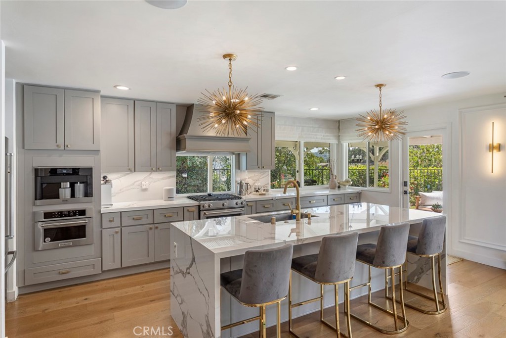 Stunning Remodeled West Hills Retreat on Expansive Private Lot. This exquisitely remodeled single-story home offers the perfect blend of privacy, luxury, and functionality. Tucked away at the end of a cul-de-sac on a private, gated flag lot, in one of West Hills' most desirable neighborhoods.
Set on an impressive 25,728 sq. ft. view lot, the property boasts a sparkling pool, a grassy area ideal for entertaining, and a large side yard perfect for a play space or BBQ area.
Inside, a thoughtfully designed open floor plan where no expense has been spared. The heart of the home is a custom-built chef’s kitchen, seamlessly flowing into the spacious living and dining areas, creating a warm and inviting great room perfect for gatherings.
The beautifully appointed primary suite is complemented by two additional bedrooms, offering both comfort and flexibility. Additional features include an attached garage with direct access and a convenient indoor laundry area.
