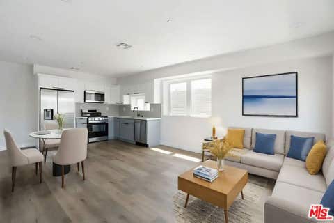 Photo of 716 W 41st Place #1, Los Angeles, CA 90037 (MLS # 26867043)