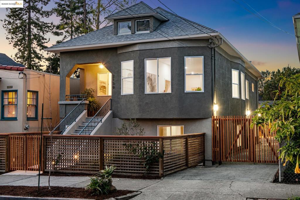 Dazzling Berkeley Bungalow with ADU and Outdoor Party Pavilion! This stunning property is nestled in the Lorin, a sweet pocket neighborhood close to the popular Elmwood Shopping District and Berkeley Bowl Market. A sweeping open floor plan includes an extensively remodeled kitchen with marble countertops and KitchenAid appliances. Located on the main level is the garden-facing primary suite brimming with natural light. The generous primary bathroom is updated with a double modern- style vanity, ceramic teal tile, and a dual rain shower system. Also on the main level you will find another bedroom, and a full bathroom updated with a dramatic modern flair. Downstairs, 3 bedrooms and 1 bathroom provide ample space for home office and guests. The garden area includes a 1 bedroom / 1 bathroom ADU. A large carport in the backyard is wonderful for outdoor entertaining or auto enthusiasts. Near BART, freeways, Berkeley Bowl, Whole Foods, Elmwood Shopping District and more!