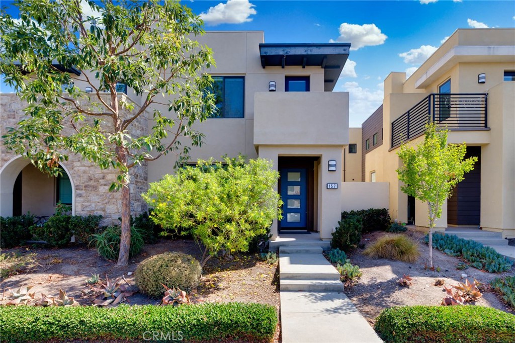 Welcome to this stunning two-story 3B3B townhome in Great Park Neighborhood. Prime location! Irvine Unified School District! Just two minutes walking distance to the upcoming Canopy retail Center in Winter 2026. The cozy home features one bedroom with full bathroom, spacious family room, kitchen on the first floor. The master bedroom with master bathroom and one guest bedroom with full bathroom are on the second floor. The whole house was upgraded with wood floorings except the stairs. Easy access to expansive Great Park amenities. Do not miss your opportunity to live the perfect SoCal Lifestyle!