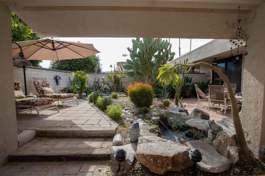 Welcome to Your Serene Oasis in The Springs, Rancho Mirage. Step into timeless elegance in this 4-bedroom gem, nestled within the prestigious Springs Country Club. Sunlight floods the open-concept interior, highlighting rich wood floors and framing breathtaking mountain views through expansive windows. Outside, a tranquil Zen garden offers the perfect space to relax, recharge, or entertain beneath the desert sky. Live the lifestyle you deserve with access to championship golf, tennis, and vibrant community amenities. This is more than a home--it's a refined escape blending luxury, light, and serenity. Don't miss your opportunity to experience The Springs at its finest.