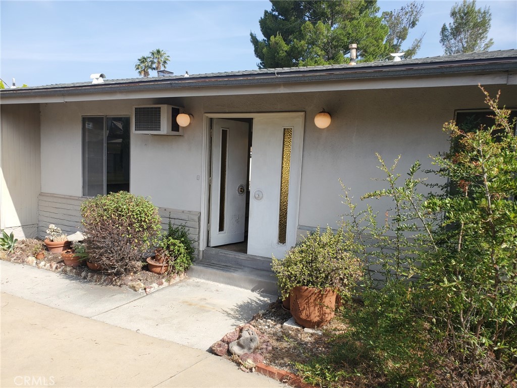 Charming Sunland Property! First time on the market in 38 years! This beautiful single-story home featuring 3-bedroom, 2-bathroom with a pool is situated on a cul - de- sac in Sunhill Estates. Property offers an excellent floor plan with tranquil mountains views from several vantage points, large living room with fireplace, very spacious bedrooms, master bedroom with good size closet and bathroom, open kitchen floor plan with lots of cabinets and dining area. The attached two-car garage includes laundry hookup's and working bench for your new projects. There is also a beautiful sunroom that is not included in the square footage. Great location with ease access to shopping, freeway, hiking trails and the Angeles National Golf Club. The secluded back yard includes a sparkling swimming pool and a beautiful garden. With just a little TLC you can turn this place into your dream home! Don't miss this great opportunity!