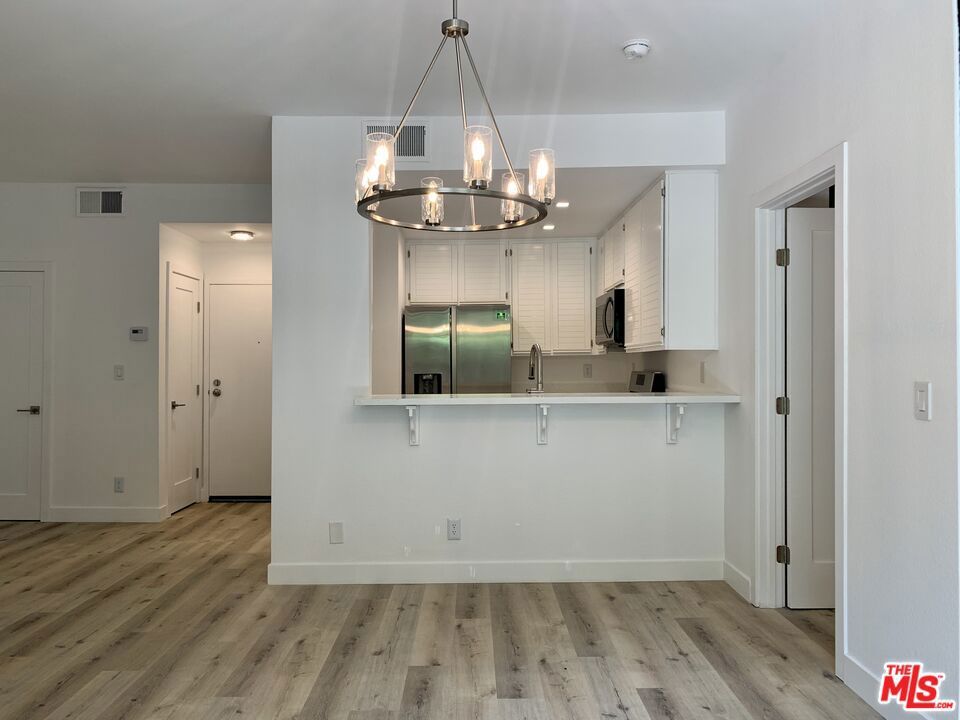 Newly-renovated, pet-friendly 1 bedroom 1 bathroom with in-unit laundry! Welcome home to this spacious end-unit in the desirable Beachport Village. Open concept living room, dining room, kitchen, and private patio, perfect for entertaining. The well-sized bedroom features an expansive closet, en-suite bathroom, and direct access to the large patio. The unit comes with two assigned parking spots, a stackable washer/dryer in the unit, and great storage and closet space. Community amenities include two heated pools, spas, clubhouse, and tennis courts. Live close to beautiful beaches, marinas, shops, and restaurants!
