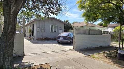Photo of 1468 E 107th St, Los Angeles, CA 90002 (MLS # DW26047029)