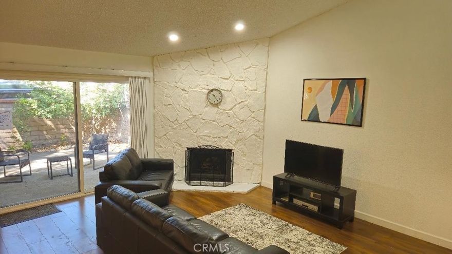 FRESH NEW LOOK! FABULOUS MAKEOVER.... Two extra large Bedrooms with in room full baths. Cathedral ceilings with light panels greet you with an open light and airy sensation. Just completed an extensive interior paint enhancement to live for! Newly remodeled Kitchen with reconditioned cabinetry, newer antique bronze hinges and custom pull knobs, newly installed non-porous counter tops and newer oven and range, vent hood, Refrigerator, Dishwasher and over stove Microwave.  Designer luxury vinyl plank flooring in Alamo Oak palette complimented by a large cozy fireplace. Newer dual pane windows and slider door adding insulation to provide an efficient interior eco system power by a newly installed central heating and air conditioning system.   Direct garage access to the kitchen provides convenience of having shelter for outdoor elements.  Steps from the popular Claremont Village shops and restaurants. Nearby pool access and your own generous extra large Patio/Yard ideal for get togethers with family and friends.