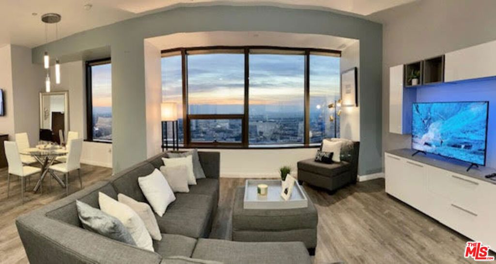 Your FULLY FURNISHED and UTILITIES PAID modern-day luxury condo is ready for move-in! Enjoy your gorgeous Southern California sunsets in LA's prestigious full service 1100 Wilshire Blvd building. This studio is fully furnished and loaded with stainless steel appliances ready for your move-in (refrigerator, stove & microwave) and an in-unit washer/dryer. Furniture includes a sofa set, dining table, 2 Smart TV's, a king size bed with a new comforter set, bathroom linen (new towels, mat, etc.), Google Nest and kitchen supplies (dishes, toaster, etc.). Your unit also comes with 2 FREE SECURED PARKING SPACES and additional guest parking as needed. This free parking amenity is hard to find in DTLA. All utilities included, including WiFi and Samsung+ Cable. This modern-day luxury skyscraper is located in Downtown Los Angeles and features spectacular views of Staples Center, LA Live and the Westside. Building amenities include a 24 hour front desk concierge and security, a 17th floor heated infinity pool and deck, a spa, private cabanas and lounge beds, a BBQ area and fire pit, a beautiful movie screening room, state of the art fitness center, business center, and on-site professional management. Your pet is also welcomed. Get ready to walk down to Staples Center located at LA Live to watch your favorite basketball team or concerts or enjoy a beautiful sunset dinner at the nearby 71Above. Don't forget to satisfy your morning caffeine fix at Starbucks across the street and take advantage of the ideal proximity to DTLA's Metro Station, Disney Concert Hall, Whole Foods Market, and so much more! Make an appointment today to come see what city living is all about.