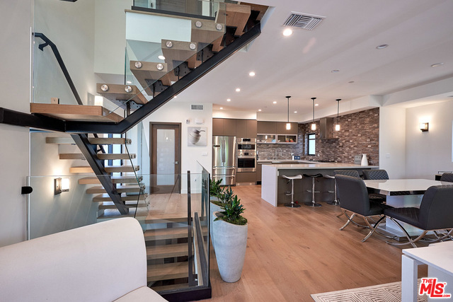 Welcome to a truly exceptional living experience at 4801 Carpenter Ave in the heart of Valley Village! "Colfax, BLUE RIBBON CHARTER Elementary School" .This magnificent 2018-built single-family home offers a seamless blend of modern luxury and sophisticated design across three impressive floors.Step inside and be captivated by the spacious living area, adorned with elegant wood flooring throughout. This home boasts 4 generously sized bedrooms and 3.5 lavish bathrooms, providing ample space and comfort. Imagine entertaining guests in the bright South/East exposure and airy living room, preparing culinary delights in a kitchen , this property offers a private attached garage with direct entrance for ultimate convenience. Enjoy scenic views from various vantage points, adding a touch of charm to your daily life. With central air conditioning and heating, comfort is guaranteed year-round.Located in a vibrant neighborhood, you'll enjoy excellent walkability and biking scores, with Colfax Charter Elementary School, Walter Reed Middle School, and North Hollywood Senior High School just a short distance away. Plus, you're minutes from Burbank Airport and enjoy easily accessible freeways to downtown Los Angeles or Santa Monica. This home is not just a residence; it's a lifestyle, offering unparalleled elegance and modern conveniences for the discerning homeowner.