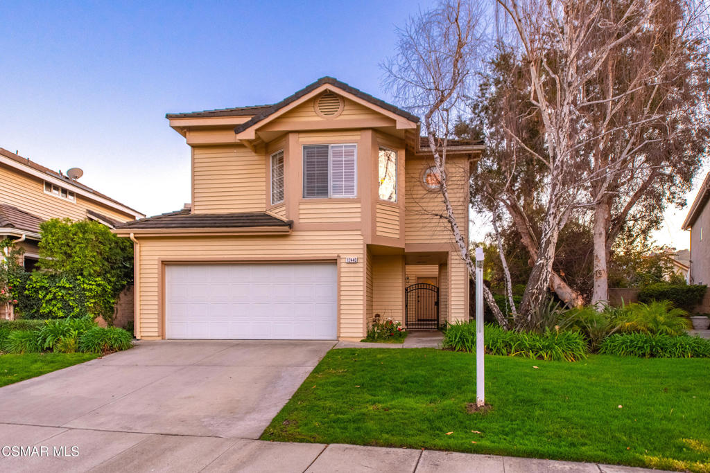 Tucked away on a quiet, tree-lined cul-de-sac, this hidden gem offers the perfect blend of exclusivity and convenience in a beautifully designed two-story home. Set on an expansive lot, this peaceful retreat features five spacious bedrooms, 2.5 bathrooms, and 2,518 square feet of inviting living space. A gated walkway leads to the welcoming entry, where soaring ceilings and a thoughtfully designed layout create an unmistakable sense of home.The living and dining rooms are bathed in natural light, offering a cozy yet elegant ambiance with a brick fireplace and picturesque views of the surrounding landscape. Whether hosting a lively gathering or enjoying a quiet night by the fire, this home offers versatility and warmth. The kitchen and family room seamlessly connect, forming the heart of the home. With ample counter space, generous cabinetry, a convenient service bar, Newer Cafe Brand appliances, and a charming breakfast nook, the kitchen is as functional as it is inviting.Ascending the grand staircase, you'll find the large primary suite, complete with a cozy sitting area and an ensuite bath featuring a double vanity, walk-in closet, dual showers, and a soaking tub--your own private retreat. Four additional bedrooms provide comfortable and private spaces for relaxation or work.The true highlight of this home is the breathtaking backyard. With lush landscaping with lemon trees, blackberries, a spacious paver patio, and an in-ground spa, this outdoor oasis is perfect for unwinding under the stars--whether by the firepit or soaking in the spa. Nestled in a cul-de-sac, the home offers a sense of seclusion while still being just minutes from shopping, parks, and top-rated schools.Additional amenities include front yard maintenance provided by the association and access to a nearby community pool and spa.