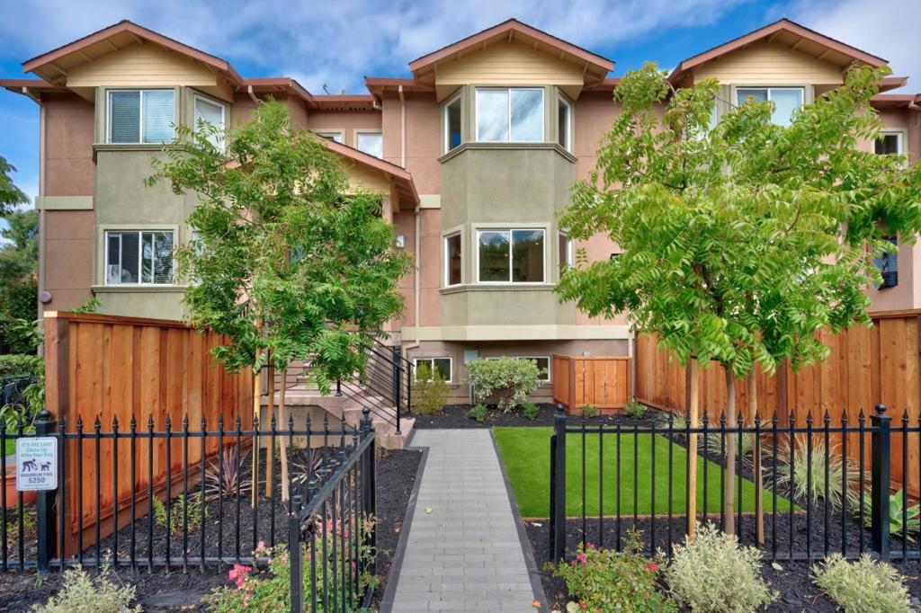 Welcome to a fresh, modern take on Menlo Park living. This recently remodeled 3-bed, 3-bath townhouse pairs crisp modern design with thoughtful updates: new oak laminate flooring, modern tile and countertops, and brand-new kitchen appliances set the tone for effortless everyday life. Two of the three bedrooms are ensuite, and the large primary bedroom adds a comfortable seating area for reading, working, or unwinding. Practicality matches the modern style throughout. All bathrooms feature new fixtures and updated cabinetry. An expansive laundry room with abundant built-in cabinetry keeps everyday essentials organized, while the oversized two-car garage provides additional storage for gear, bikes, and more. An efficient heat pump HVAC system delivers consistent heating and cooling. From this conveniently located Menlo Park address, youre minutes from Stanford University and close to leading Silicon Valley employers, including Meta and Oracle. You'll appreciate the quick connection to Highways 101 and 280 for simplified commuting across the Peninsula. Move-in ready, beautifully updated, and perfectly situated.
