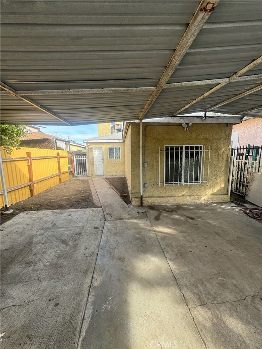 Nestled in an up and coming neighborhood this 2 story spacious home offers Los Angles living at a fraction of the cost. This home is located close to transportation and easy freeway access to all major attractions that so cal has to offer. This 3 bed 2 bath home also features a carport to park your vehicles plus a cozy backyard for entertaining for those holiday get togethers.