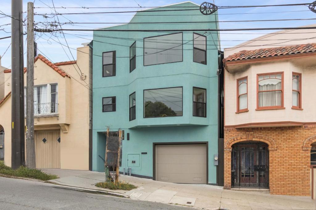 Stunning residence in the heart of Mission Terrace! Welcome to 276 Seneca Ave. This fully renovated, three-level home offers five spacious bedrooms and five elegantly designed bathrooms. The open-concept layout showcases a brand-new kitchen with custom cabinetry, quartz countertops, and stainless steel appliances. Thoughtful upgrades include a new roof, epoxy garage flooring, and designer finishes throughout. On the 3rd level, wide open loft and 2 beds and 1 bath. The lower level has been fully legalized, including a sunroom. Adding a flexible living space perfect for guests or extended family. Ideally located near BART, Muni, shops, and freeway access, this turnkey home blends modern luxury with exceptional convenience.