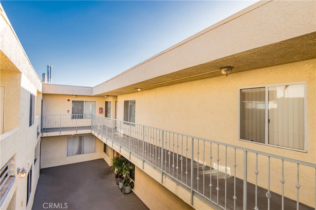 Photo of 7045 Woodley Avenue #218, Van Nuys, CA 91406 (MLS # SR25260462)