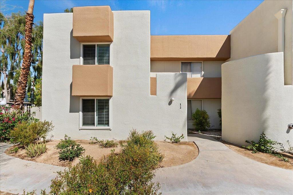 Welcome to your own Palm Springs escape. Condos are rarely available in Hermosa Villas, and this one was beautifully refreshed in 2023 -- with a modern new kitchen (appliances, cabinets, countertops), engineered hardwood floors throughout, and fully updated bathrooms. Timeless wood shutters frame sunny desert views.Inside, the spacious bedrooms and generous closets make life feel organized and easy. Outside, your private fenced patio is ready for slow morning coffee, quiet evenings under the stars, or cocktails with friends before heading out. You'll have a covered carport with extra storage, gated parking, a sparkling pool and spa and community laundry conveniently located in close proximity to the unit.Perfect as a low-maintenance full-time home or effortless second getaway -- simply lock the door and go when you need to. Prime location just 5 minutes to downtown Palm Springs and 7 minutes to the airport--in the heart of shopping, dining, and amenities. Lease to own could be an option, contact your agent for more details!