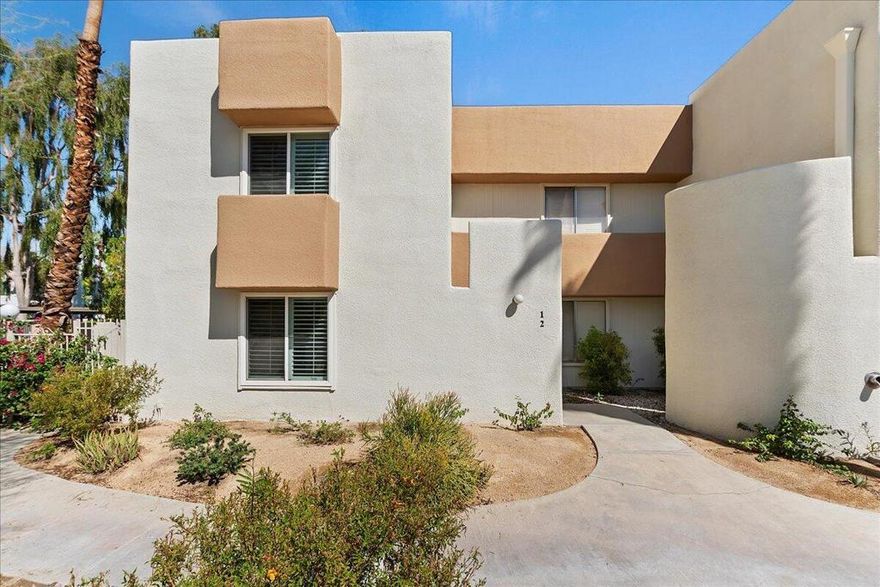 Welcome to your own Palm Springs escape. Condos are rarely available in Hermosa Villas, and this one was beautifully refreshed in 2023 -- with a modern new kitchen (appliances, cabinets, countertops), engineered hardwood floors throughout, and fully updated bathrooms. Timeless wood shutters frame sunny desert views.Inside, the spacious bedrooms and generous closets make life feel organized and easy. Outside, your private fenced patio is ready for slow morning coffee, quiet evenings under the stars, or cocktails with friends before heading out. You'll have a covered carport with extra storage, gated parking, a sparkling pool and spa  and community laundry conveniently located in close proximity to the unit.Perfect as a low-maintenance full-time home or effortless second getaway -- simply lock the door and go when you need to. Prime location just 5 minutes to downtown Palm Springs and 7 minutes to the airport--in the heart of shopping, dining, and amenities. Lease to own could be an option, contact your agent for more details!