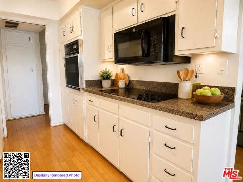 Tiny photo for 11656 Montana Avenue #302, Los Angeles, CA 90049 (MLS # 26851771)