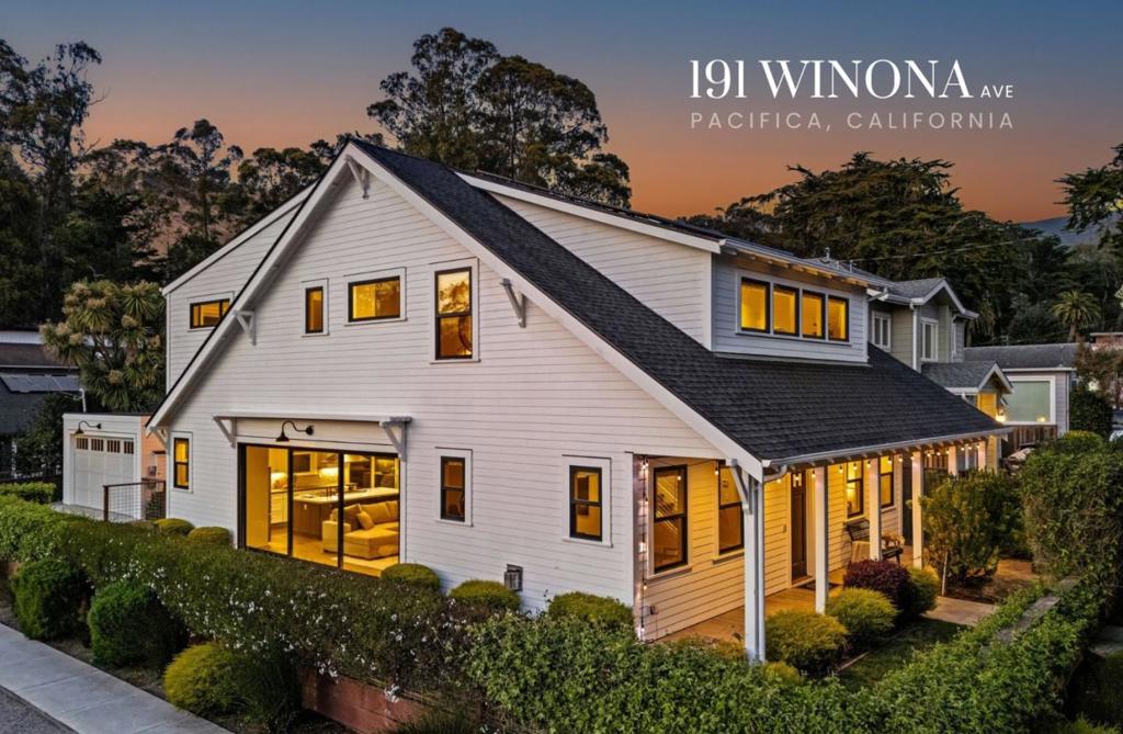 A Custom-Built Modern Farmhouse Moments From the Ocean | This is where memories are made: dinners shared under the string lights, toasts made around the fire pit, and lazy afternoons spent lounging with family throughout the expansive upper and lower living areas. Set within the charm of Vallemar, one of Pacifica's most desirable neighborhoods, this open-concept home is an absolute showstopper. Architecturally, it features a classic coastal farmhouse design with hallmark lap siding & porch, and was intentionally designed to blur the lines between the in & outdoors. Impressive triple-panel glass sliding doors on the main level flood the home with natural light while providing an expanded living room for easy entertaining. Other notables include rich engineered hardwood, calming neutral finishes, designer stone & tile work, Bertazzoni range, RH vanities, custom railings complete with a bespoke baby gate on the upper level, mudroom, mature landscaping that offers a natural privacy screen around the residence, and a prime corner location within walking distance to Vallemar Elementary. Just moments away from Linda Mar Beach,hiking,Soul Grind Coffee, & the Farmer's Market, you'll be living the coastal lifestyle you've envisioned in no time. Just don't let this one slip away...