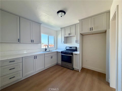 Photo of 1426 1/2 W 83rd ST, Los Angeles, CA 90047 (MLS # DW26231490)