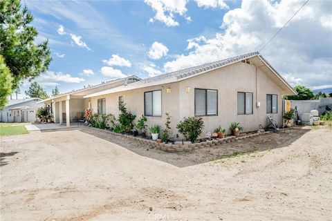 Photo of 9980 Johnson Rd, Phelan, CA 92371 (MLS # IV26078196)