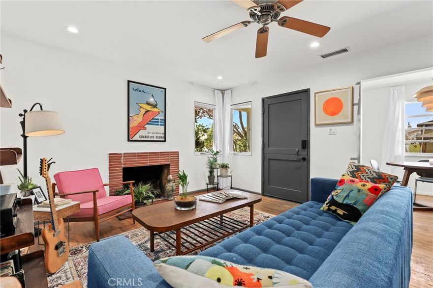 Charming Beach Bungalow with Endless Potential!

Welcome to this quintessential beach bungalow that exudes warmth and character from the moment you step onto the darling front porch with its inviting Dutch door. The fenced-in front yard adds privacy and curb appeal, perfectly complementing the original rustic hardwood floors that flow throughout the home.

Inside, the cozy living room features a gas fireplace and an open dining and kitchen concept — ideal for both relaxing and entertaining. The kitchen is a cook’s dream with double sinks, wood cabinetry, and a spacious walk-in pantry that offers maximum storage capabilities.

The main house boasts two spacious bedrooms and a beautifully remodeled bathroom. Enjoy the modern touches of white subway tile, a sleek vanity, and a tub, all complemented by the convenience of a stackable laundry setup.

Step outside to the Mangarus natural wood deck, which is termite-proof and shaded by a lovely wood canopy — perfect for enjoying your morning coffee or evening breeze.

The detached ADU (not permitted and originally the 2 car detached garage) features luxury vinyl floors and a stunning attached bathroom with caustic concrete tile, a step-in shower, and a modern vanity. Connected to the ADU is an art studio that can easily double as a gym, office, or creative workspace.

The backyard is a true oasis w/so much potential....bring your ideas to create a perfect space for your family with Bose blue flagstone tiles and stamped concrete stepping stones leading to a charming brick patio, complete with extra storage and a large workshop equipped for all your DIY projects.

Additional upgrades include ABS sewer and copper plumbing, a new 200 amp main electrical panel, a new water heater, dual-pane windows, and a full HVAC system with AC for year-round comfort.

With ample driveway parking for five cars, this home blends coastal charm, modern convenience, and incredible potential for your dream beach lifestyle!
Located conveniently in the heart of Hawthorne with easy access to freeways, beaches, shops and restaurants!