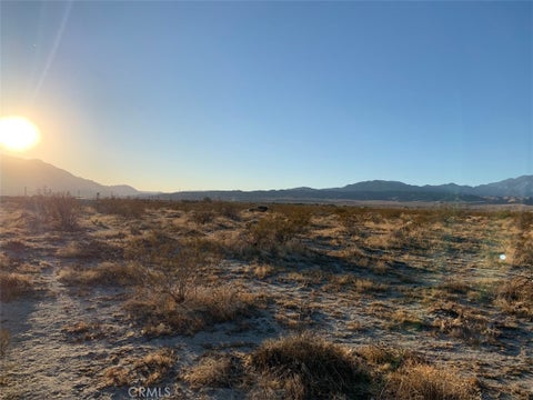 Photo of 11650 Desert Terrace Way, Desert Hot Springs, CA 92240 (MLS # IV26205819)