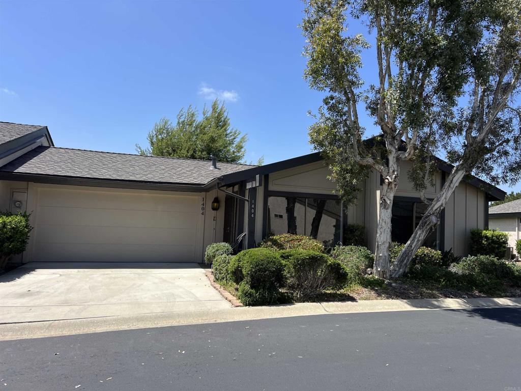 Welcome home to 1404 Lombard Street, located in the desirable 55+ Senior community of Nob Hill. This light and bright END unit features 2 bedrooms and 2 baths with vaulted ceilings, gas fireplace, vinyl wood flooring, saltillo tiles in kitchen and updated bathroom cabinets. Recent upgrades include fresh paint throughout, new stainless steel dishwasher, upgraded kitchen sink with faucet, plus new faucets and toilets in both bathrooms. Only one shared wall (garage/laundry) for added privacy. Private patio with open space behind, indoor laundry, and attached 2-car garage with plenty of storage. Secondary bedroom includes built-in murphy bed. Great opportunity to personalize AND MAKE IT YOUR OWN. Quiet private street with no thru traffic. Community includes sparkling pool & spa, clubhouse, greenbelts, guest and RV parking. Close to shopping & dining. Very Clean and READY to GO!!!! Seller to Pay up to $10K towards buyers buy down.