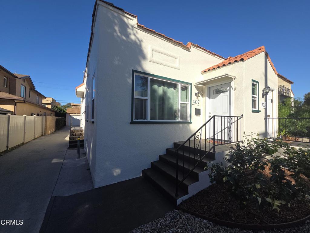 Welcome to 407 South Verdugo in Glendale. This two-bedroom, one bathroom home has been freshly painted and ready for move in. Upon entering there is a living room in the front which has a hall on the right side that leads to the kitchen, dining area, both bedrooms and the bathroom. Off the kitchen is a separate laundry room with additional access to the outside. All window are dual pane windows which assists in keeping outside noise down as well as energy costs low. This comes with a detached two car garage that can be used for storage or for parking. A great feature about this unit is that the common wall is not next to the bedrooms. The common wall is on the hall so there is minimal chance of any noise and creates privacy. This part of Glendale is close to the Americana, parks, the Glendale Galleria, and Eagle Rock. It is a quick drive to Old Town Pasadena, JPL, Descanso Gardens, Hollywood Airport, Burbank and the studios, and not far from downtown Los Angeles and Dodger Stadium. Come check out this lovely home and make it yours before the holidays.
