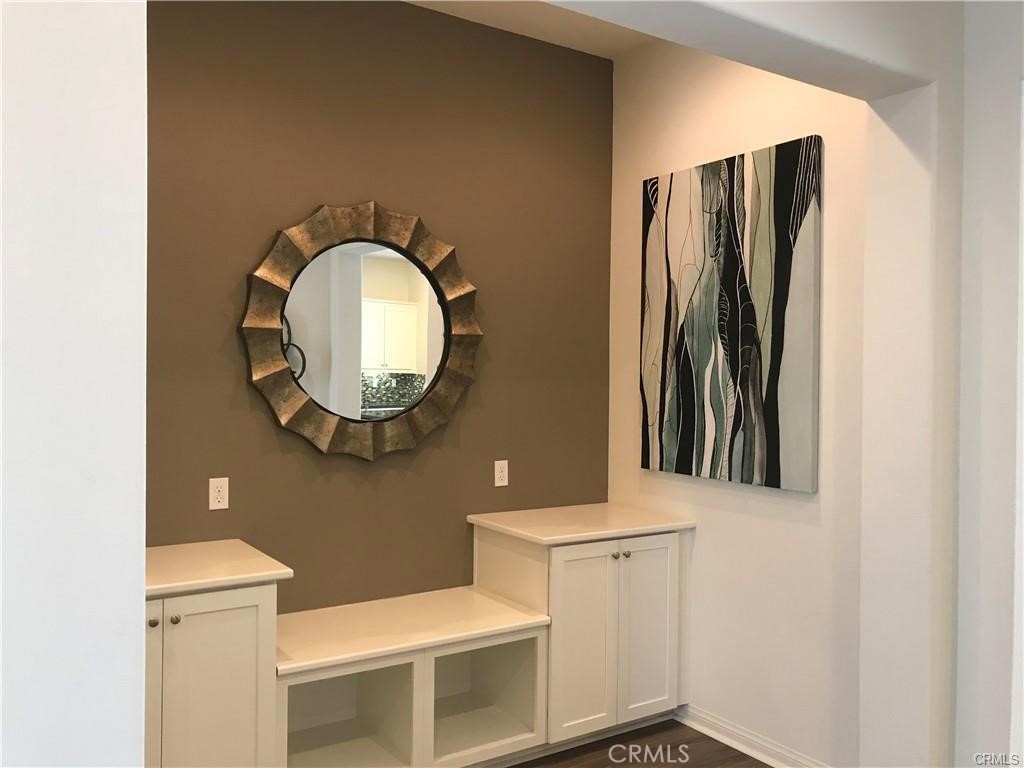 Like NEW!!! Portrait at Glendora is like a jewelry near route 66. Enjoy the walking distance to shops, easy access to 210 freeway and best schools around the area. Beautiful 10F ceiling single story home featuring 3 bedrooms, 3.5 bathrooms. All bedrooms come with their own bathroom. 2266 square feet open floor plan. professional chef's extra large kitchen with center island, stainless steel sink, gray quartz kitchen counter-tops, stainless steel professional appliances include build in wall oven, microwave, dishwasher, 5 burner stove and hood. White wood cabinetry throughout, recycle bins, pull-out drawers, and huge walk-in pantry. Wood laminate flooring. Master bathroom boasts giant soaking tub, walk in shower, and dual vanities, walk in closets throughout, large in door laundry area with washer and dryer. Recess lighting, ceiling fan outlets, USB ports, coax cable and telephone jacks in select locations. Nice fully landscaped backyard with block wall and vinyl side fencing. The house is leased with all wall decorations.