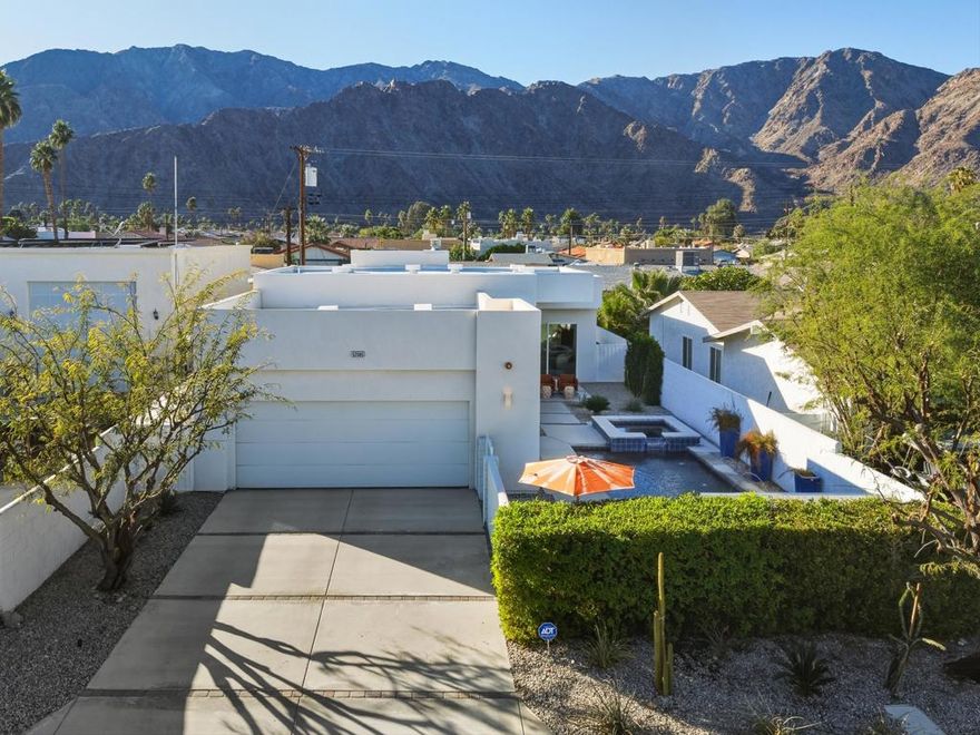 Welcome to 52085 Avenida Herrera, a contemporary desert masterpiece located in the highly sought-after La Quinta Cove--home to world-class hiking trails, breathtaking mountain scenery, charming parks, the farmer's market, and the vibrant shops and dining of Old Town La Quinta. Built in 2016 with quality construction and refined finishes, this residence blends modern design with the tranquility of desert living. Soaring 12-foot ceilings and expansive windows fill the great room with natural light, creating an open and inviting environment perfect for relaxing or entertaining. The private gated courtyard is a true retreat, featuring a sparkling pool and spa surrounded by beautiful mountain views that embody the peaceful ambiance La Quinta is known for. The chef-inspired kitchen includes white ceramic porcelain tile floors, sleek quartz countertops with a breakfast bar, and top-of-the-line stainless steel appliances. Each spacious bedroom features 10-foot ceilings, mirrored sliding closets, and plush Berber carpeting for added comfort. The primary suite offers a generous walk-in closet, while the bathrooms showcase custom tile work and brushed nickel finishes for a clean, contemporary look. Offered furnished per inventory and ready for immediate enjoyment. Home is pre inspected with a full home inspection report available for your review.