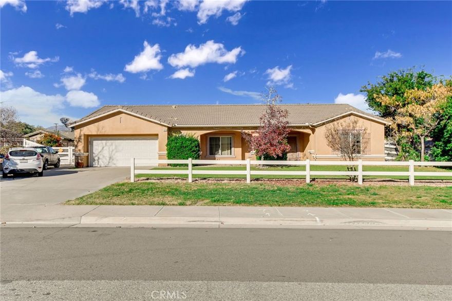 You have to see this three bedroom, two bathroom home with a two bedroom, one bathroom casita. Yes, that is five bedrooms and three bathrooms total. Unique for sure! Come see the open floor plan and large backyard, including two storage sheds and mature landscaping. The low maintenance yard is covered with artificial turf, gravel and concrete walkways. Use the casita as an office, guest house or for your extended family. It is located just steps away from the main house. Hard surface flooring, carpet in bedrooms. Clean white tile counters, a handy laundry room and space for a small table in the eat-in kitchen. There is a formal dining room, carpeted, updated hall bathroom in the main house. Primary suite has a walk-in closet and roomy ensuite. Fenced-in patio just outside. Quiet neighborhood with lots of space. Just below the mountains where you can visit Idyllwild and other mountain communities. You will love the area and the home. Consider making this your new home.
