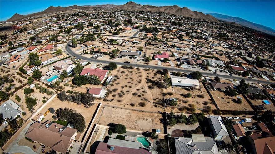 Prime Desert Knolls Lot - Bring Your Vision to Life!  An exceptional opportunity in Apple Valley.  This .689 +/- acre parcel offers a rare combination of space, location and potential in an established area known for quality homes and desert charm.  Perfectly LEVEL and ready for your dream home.  Situated just minutes from St. Mary's Medical Center, multiple medical offices, and the Apple Valley professional corridor.  Enjoy easy access to I-15, placing you within reach of all the high desert has to offer -- and just a short distance from Brightline West's future high-speed rail station, expected to be operational by 2028, connecting Southern California to the Las Vegas strip.  Bring your vision to light on this prime Apple Valley lot - a perfect blend of opportunity, accessibility, and future growth potential in one of the region's most desirable communities.  Buyer to perform all due diligence to verify property is suitable for buyer's intended use.