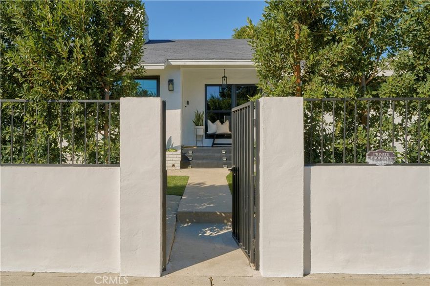 Welcome to this beautifully reimagined 3-bedroom, 2-bathroom residence that perfectly blends contemporary sophistication with timeless Sherman Oaks charm. Every detail of this remodeled home has been thoughtfully curated to highlight both elegance and comfort. Bathed in natural sunlight, the home showcases original oak hardwood floors, a breathtaking double-sided brick fireplace. The spacious living room provides the ideal setting for both relaxed evenings and elegant entertaining, radiating a warm, inviting atmosphere that feels both luxury and comfort. A versatile bonus room offers endless possibilities—perfect for a private office, playroom, creative workspace, or an additional fourth bedroom. For everyday convenience, the home features an in-unit laundry area, discreetly tucked away yet easily accessible, offering modern functionality without compromising style. At the heart of the home, the gourmet kitchen has been fully transformed with custom cabinetry, a marble-topped island, and top-of-the-line stainless steel appliances, a true chef’s dream. The open layout seamlessly connects to the formal dining area, a sun-drenched enclosed sunroom, and a covered outdoor patio, creating an effortless flow for both indoor and outdoor entertaining. Step outside to your private backyard retreat, complete with a covered patio and lush mature landscaping. Whether hosting intimate gatherings or weekend barbecues, the outdoor space is designed to impress. Additional highlights include a two-car garage with extra storage, new HVAC system, energy-efficient windows, and countless designer touches throughout. Ideally situated in one of Sherman Oaks’ most desirable neighborhoods, you’ll enjoy close proximity to Ventura Boulevard, Westfield Fashion Square, Whole Foods, Trader Joe’s, and easy freeway access. The home is located within the district of top-rated schools, including Riverside Drive Charter Elementary and Notre Dame High School.