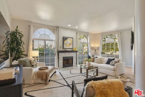 Photo of 5848 W Olympic Boulevard #102, Los Angeles, CA 90036 (MLS # 26675793)