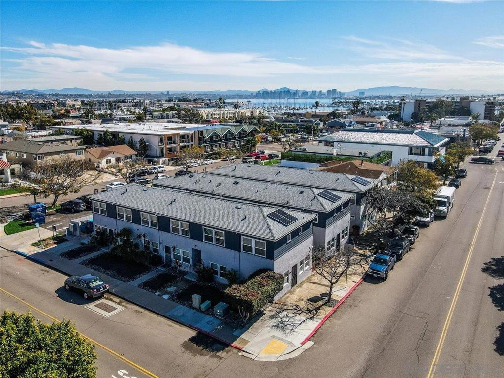 3034-50 Canon Street is located just blocks from La Playa and Shelter Island. The 3 structures totaling 12,410 square feet built in 1947 are situated on a 10,108 square foot lot. There are seventeen spacious 1 Bedroom / 1 Bathroom units and one commercial unit. The units have all been remodeled with plank flooring, horizontal window coverings, and new ceiling fans which complement the tile countertops and existing built ins. There is assumable financing at 3.95% fixed until March of 2027 with Chase Bank with a current balance of approximately $2.4M. Solar Panels were recently installed as well as new windows and tankless hot water heaters. There are two laundry rooms with leased equipment. There are back and central patio areas with bike storage. The property is in a central location across the street from Cabrillo Elementary School and a few blocks from Liberty Station. Point Loma is a scenic peninsula with panoramic views of the Pacific Ocean, San Diego Bay, Coronado Island and Downtown San Diego. The picturesque coastline and is known for its sunsets and has created a desirable living environment, attracting residents and tourists alike. This natural beauty enhances the value of properties in the area. Point Loma boasts a rich history and a vibrant community. The neighborhood is home to the renowned Cabrillo National Monument, which commemorates the landing of Juan Rodriguez Cabrillo in 1542, making it a popular tourist destination. The area is also known for its military presence, with Naval Base Point Loma.
