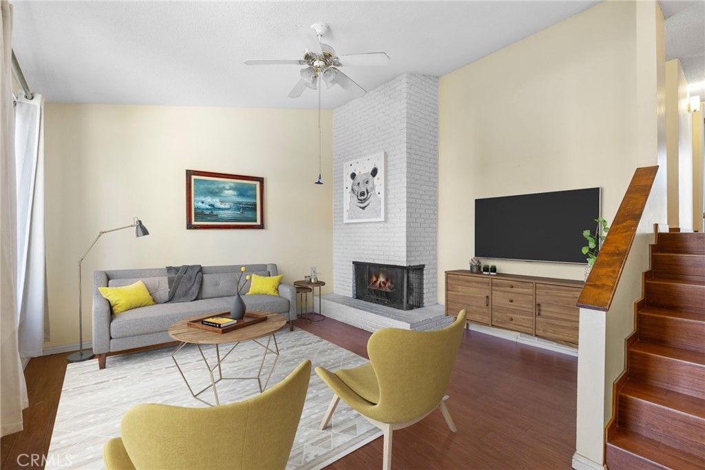 Ideal condo near Bakersfield College with HOA-covered amenities including landscaping, pool, roof, exterior paint, pest control, insurance, water, trash, and professional management! Located just 1.8 miles from BC with easy Hwy 178 access, plus a coffee shop and dining within walking distance—perfect for students, first-time buyers, or investors. This desirable end unit offers added privacy with only one shared wall, a new roof, and a 2-car attached garage for convenience and secure storage. The living room features a striking floor-to-ceiling brick fireplace, wood-look tile flooring, and abundant natural light. The kitchen includes warm wood cabinetry, bar-top seating, and neutral tile finishes. Upstairs, the spacious primary suite boasts its own private balcony and a beautifully tiled shower, while the second bedroom also enjoys balcony access. A jetted tub in the hall bath adds a relaxing touch. This is a smart buy in a great location—schedule your tour today!