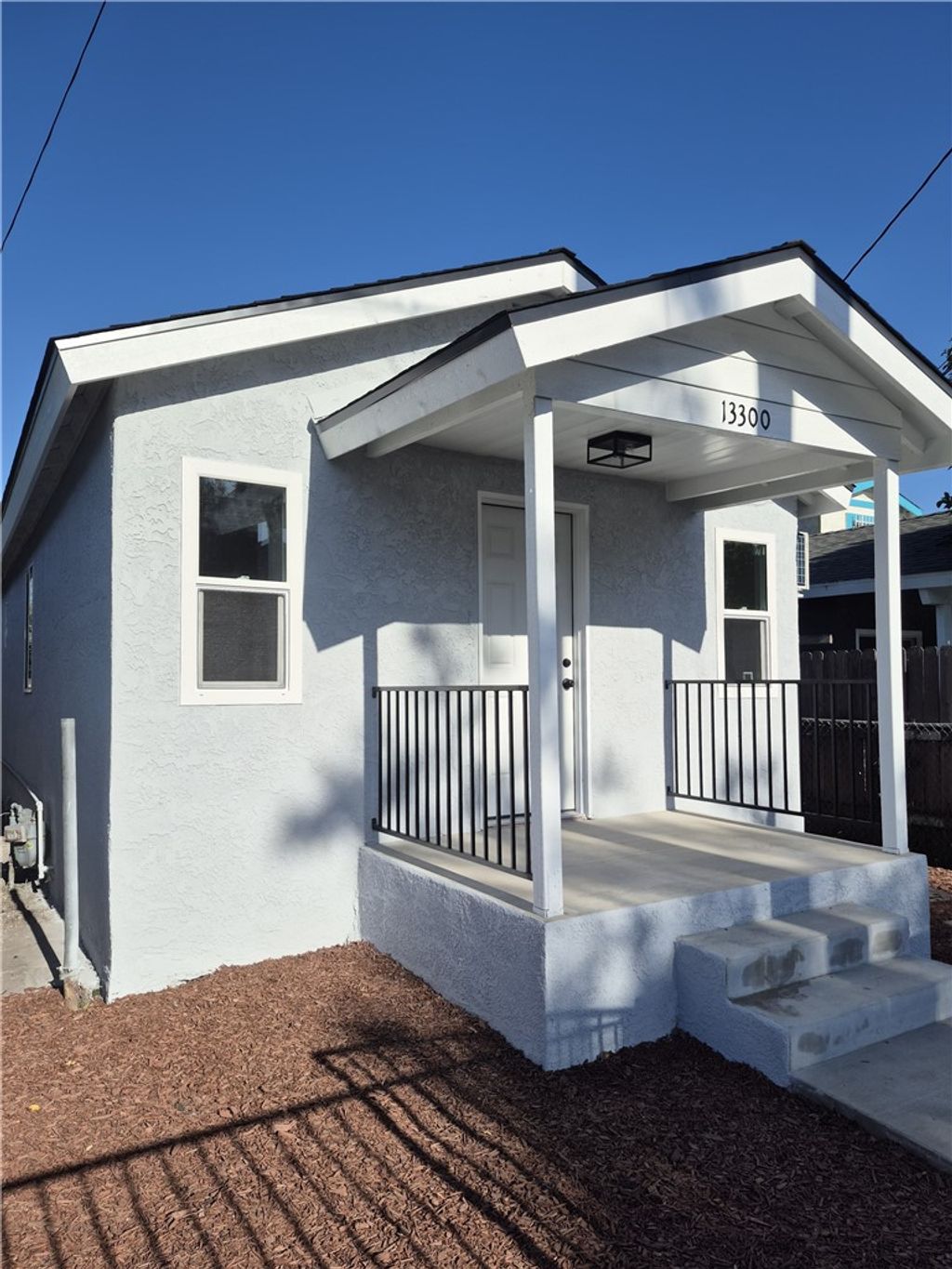 Photo of 13300 S Largo Ave, Compton, CA 90222 (MLS # DW26041057)