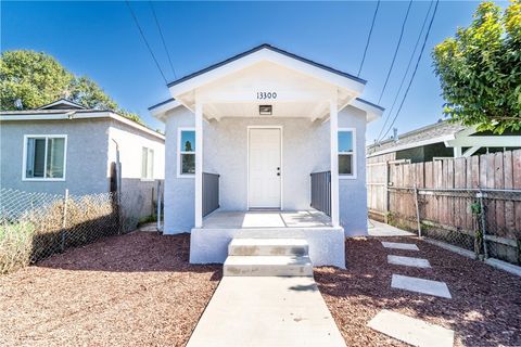 Photo of 13300 S Largo Ave, Compton, CA 90222 (MLS # DW26041057)