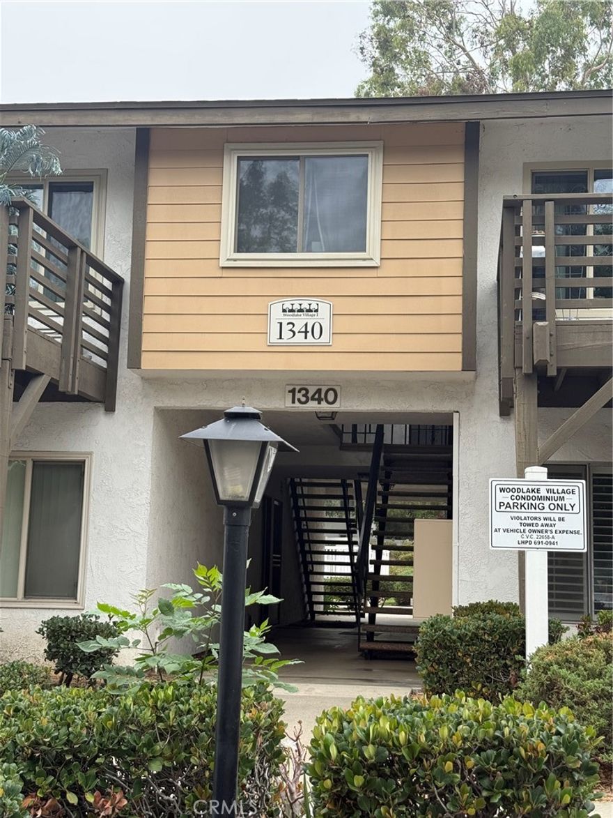 This outstanding condo boasts one of the prime locations in the complex, featuring a one-car garage and an additional open parking space. The patio feels like your own backyard, offering one of the largest fenced patio/yard areas in the community. Conveniently located near abundant shopping, dining, and entertainment options. The first-level entry adds to its accessibility. Recent updates include laminate flooring throughout.  Kitchen cabinets painted and newer dishwasher in the kitchen. Condo amenities are located close by including the Pool and Community Laundry.