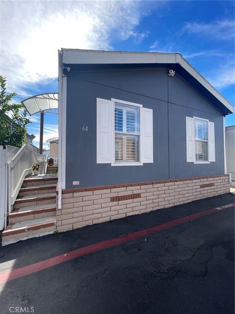 Photo of 7560 Woodman Place #64, Van Nuys, CA 91405 (MLS # SR26146675)