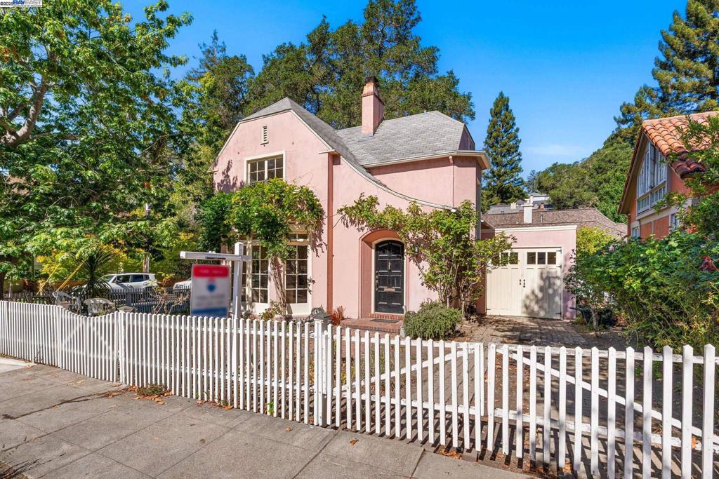 Full of curb appeal and character, this adorable pink stucco home sits on a shaded, fenced corner lot in one of the area’s most desirable neighborhoods. With its gingerbread-style design, this charming storybook home will look perfect decked out for the holidays!Enter the home to find a bright, welcoming interior with warm wood flooring and crisp neutral walls. The layout flows naturally for entertaining, beginning with a large foyer that leads into the massive living room. Floor-to-ceiling windows fill the space with sunlight. The kitchen and breakfast nook connect seamlessly to the living room, and a formal dining room offers extra space for gatherings. A dedicated laundry room completes the main level. Upstairs, you’ll find a full bathroom and three spacious bedrooms, each with a big walk-in closet. This location is unbeatable. You’ll be within walking distance of neighborhood favorites like Paulista Brazilian Café and Blackberry Bistro, just 4 minutes to Dimond Park, and 10 minutes to Lake Merritt for boating, biking, and paddle boarding. Great parks and highly rated schools from elementary through high school are all within 5 minutes. Downtown Oakland is 15 minutes away, and it's about 20 minutes to Oakland International Airport! With its unique charm and fantastic location