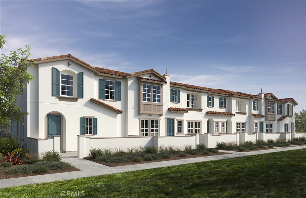 Moonstone Community is a beautiful new resort-style community in South Ontario. This floorplan offers a great open 1,555 sq/ft floor plan with expansive 9-ft ceilings and a bright and airy feel that is offered by this great corner unit with side windows. One of our last driveway lots! The stylish kitchen features white shaker cabinets, an expansive kitchen island, with a stainless single basin sink, dining area, granite countertops. Our homes offer brand-new Whirlpool® stainless steel appliance suite: gas stove, dish washer and out-side vented microwave. Additionally, there is convenient powder room downstairs for your guests. The upstairs lead to a spacious primary bedroom with a large walk-in closet and a luxurious adjoining bath with cultured marble countertops, dual undermount sinks and walk-in shower. There is an upstairs laundry room and linen closet for added convenience. The two secondary bedrooms are opposite the primary bedroom and include white mirrored closet doors. The large hallway bathroom has tub/shower combination, undermount sink with cultured marble countertop. The exterior of the home has water-efficient front landscaping beyond the private patio.The energy efficiency of our Energy Star® certified home is complemented by an eco-friendly SunPower® solar energy system (either lease or purchase required). Additional eco-friendly features are a tankless water heater, and Smart thermostat, and double-pane, low E glass windows to help ensure uninterrupted comfort all year long. Future community amenities include two parks, pool and spa, dog park, and pickleball courts. There is easy access to I-15, I-10, and 60 Freeways. You are also close to shopping at Costco®, 99 Ranch Market & Cloverdale Marketplace and Eastvale Gateway. The Ontario International Airport and Ontario Mills Mall are a short drive away. Moonstone is also just 2.5 miles from the brand-new Park View elementary school.
Photo is a rendering of the model. Buyer can either lease or purchase the Solar.