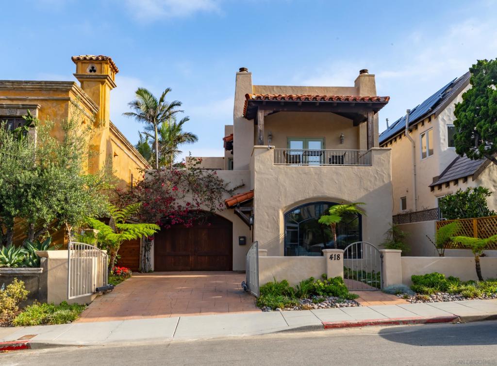 This beautiful two-story coastal home offers the perfect blend of refined interiors and breezy outdoor living, just blocks from the ocean in one of La Jolla’s most sought-after neighborhoods. Featuring 3 bedrooms and 3 full bathrooms, this property captures the essence of Southern California lifestyle with its seamless flow, abundant natural light, and multiple outdoor spaces ideal for relaxation and entertaining. The main level features sophisticated travertine stone flooring and an open-concept layout that connects living and dining areas to spacious patios. Upstairs, newly installed hardwood floors add warmth and continuity throughout the private living quarters. The expansive primary suite serves as a serene retreat, highlighted by a cozy gas fireplace, an ensuite bathroom, and a private ocean-view deck—an ideal place to watch the sunset over the Pacific. With thoughtful upgrades throughout and a location just steps to the beach, local dining, boutique shops, and top-rated schools, this home offers an unparalleled opportunity to experience the very best of coastal La Jolla.