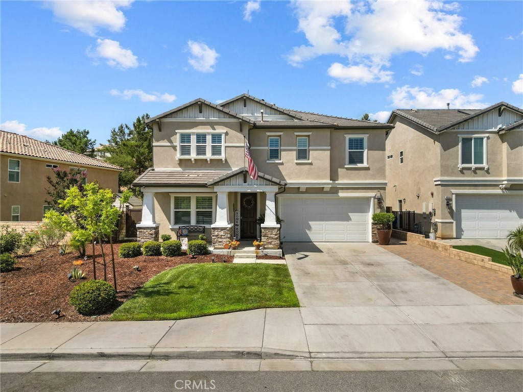 Welcome to this desirable home in the Plum Canyon Community with NO MELLO ROOS & LOW HOA. This stunning home offers an ideal blend of elegance and functionality. You are greeted by a spacious front yard and a beautifully designed open floorplan upon entry. The main level features a convenient bedroom and full bath, perfect for guests or private office space. The living room features a custom built-in entertainment center, complete with a rock wall and electric fireplace for cozy evenings. The updated kitchen boasts new quartz countertops, backsplash, and hardware, along with a massive center island with a breakfast bar and oversized sink. The main level also features a custom dry bar with its very own wine fridge. Upstairs, a sprawling loft provides additional versatile living space. The primary suite boasts a giant walk-in closet that will exceed your expectations. Another bedroom upstairs also includes its own full bathroom and walk-in closet, ensuring comfort and privacy for all. Additional interior upgrades include new flooring downstairs, plush carpeting upstairs, fresh paint throughout, custom shutters throughout, new fans in all bedrooms and loft, and new lighting fixtures throughout the main level. Outside, enjoy the benefits of a covered patio with ceiling fans, perfect for outdoor gatherings. The built-in outdoor kitchen is a chef’s dream, equipped with a BBQ, sink, stovetop, bar top, and fridge. The backyard also includes a fountain, custom stone/brick masonry work throughout, and a tucked-away shed for added storage and convenience. Additional highlights include a 23-panel solar system, epoxy floors and custom storage racks in the garage, a brand-new tankless water heater, and a wall-mounted Tesla EV charger hookup. This meticulously upgraded home with its prime location, including no direct rear neighbor, presents an exceptional opportunity for luxurious living.