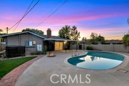 Welcome to this charming 3 spacious bedroom, 2 renovated bathroom home situated on an ideal 7,457 sq ft corner lot in one of West Hills' most desirable neighborhoods. Offering 1,370 sq ft of living space, this residence blends comfort, functionality, and modern style. Step into the tastefully remodeled kitchen, featuring crisp white cabinetry, quartz countertops, and stainless steel appliances—perfect for home chefs and entertainers alike. The open layout flows seamlessly into the main living space, making everyday living and hosting effortless. The primary suite offers a peaceful retreat with an updated en-suite bathroom showcasing a stylish modern shower. Both bathrooms have been thoughtfully upgraded for comfort and style Outside, enjoy California living in the private backyard oasis, complete with a refreshing pool and a covered patio is absolutely ideal for outdoor dining, relaxing, or entertaining year-round. Additional highlights include solar panels for energy efficiency and long-term savings and expensive high end finishes throughout. Strategically located just minutes from top-rated schools, local parks, high end restaurants, shopping, and all of the communities vast amenities makes this home perfect for luxurious family living.