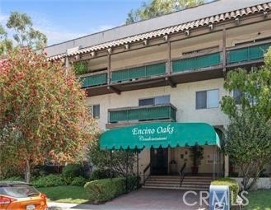 Discover this beautiful condominium in the heart of Encino. The kitchen offers ample cabinetry and stylish tile flooring, and the living area opens to a private balcony that is perfect for enjoying morning coffee or unwinding at the end of the day. The community includes a sparkling pool, a tennis court, and a well-equipped gym. Two dedicated parking spaces add extra convenience, and the shared laundry facility makes daily tasks simple. With easy access to major freeways, you are only minutes from popular shopping, dining, and entertainment. This condo is more than a comfortable home because it delivers a vibrant, convenient lifestyle in a sought-after neighborhood.