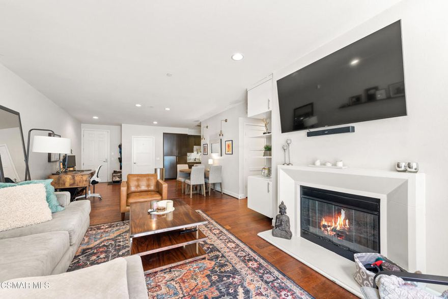 Situated in the highly desirable neighborhood of Toluca Lake, this spacious  and stylish 3-bedroom, 3-bathroom condo is freshly painted and offers a perfect blend of comfort, functionality, and modern updates. The open and inviting floor plan is thoughtfully designed to accommodate both everyday living and entertaining. Step into the main living area, where warm wood-like flooring, recessed lighting, and a fireplace create a welcoming ambiance. The updated kitchen is outfitted with granite countertops, ample cabinet space, and a convenient layout for cooking and entertaining.The generously sized primary suite serves as a relaxing retreat, featuring a walk-in closet and a spa-inspired bathroom with dual vanities, a separate glass-enclosed shower, and a luxurious Jacuzzi tub. The two additional bedrooms are connected by a shared Jack-and-Jill bathroom, also equipped with dual sinks, allowing for both privacy and practicality.Additional highlights include a dedicated laundry room with storage space and a private patio ideal for morning coffee or evening relaxation. This well-maintained unit is part of a secure and quiet community with controlled access, a rec room with kitchen, and it offers convenient proximity to local dining, shopping, studios, and freeways--making it a prime opportunity for anyone looking to enjoy the best of Toluca Lake living.