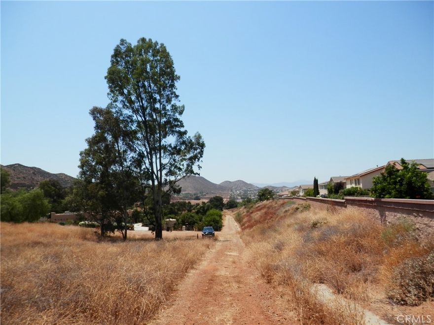 Exciting new listing! Offering a collection of 3 contiguous lots in the growing city of Wildomar, in Riverside County. Located north of the 15 Freeway and Cottonwood Canyon Road, at Hemlock St., Power is nearby the topography varies from flat to gently rolling, offering scenic views and flexible development potential. Short drive to I-15, I-215, and Hwy 74, Proximity to Loma Linda University Medical Center, Mt. San Jacinto College, shopping centers, and schools. Located near Canyon Lake, Menifee, and Lake Elsinore. Whether you’re looking to develop one home or invest in multiple parcels, this is an excellent opportunity in one of Southern California’s fastest-growing regions. Enjoy privacy, convenience, and beautiful surroundings, not quite off the grid, but close to nature. Buyer to verify land use and development potential with the City of Wildomar Planning Department. APN: 361-051-008 ; 361-051-009; 361-051-010 ; Size: 25,600,000 S.F ; Zoning: RR ; Terrain: Flat to rolling ; GPS: 33.655924, -117.234504 (N.W Corner)