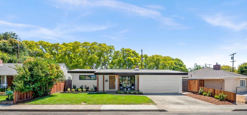 Tucked in a quiet three-home cul-de-sac, this fully renovated single-level gem in the heart of Santa Clara was remodeled with permits by Primework Construction. High-end finishes throughout, including primary suite and a stunning chef's kitchen with a waterfall island, custom porcelain countertops, backsplash, and a full suite of professional-grade ZLINE stainless appliances. Rich hardwood floors, recessed lighting, and seamless indoor-outdoor flow enhance the open-concept layout. Both bathrooms feature floor-to-ceiling porcelain tile, frameless glass enclosures, and spa-like details. Major upgrades include a new 200-amp electrical panel, central A/C, dual-pane windows, new insulation, and copper plumbing. The landscaping is fully redone with drought-tolerant plants, irrigation, and an inviting patio perfect for entertaining. Located just minutes from Apple, Nvidia, Santana Row, Central Park, and Main Street, Cupertino, the home also benefits from low-cost electric service via Silicon Valley Power. Zoned for Westwood Elementary, Buchser Middle, and Santa Clara High. This property blends modern design, efficient systems, and unbeatable access to the Valley's top employers. Silicon Valley living at its best.