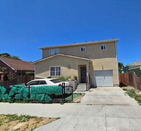 Photo of 1633 E 85th Street, Los Angeles, CA 90001 (MLS # PW26082470)