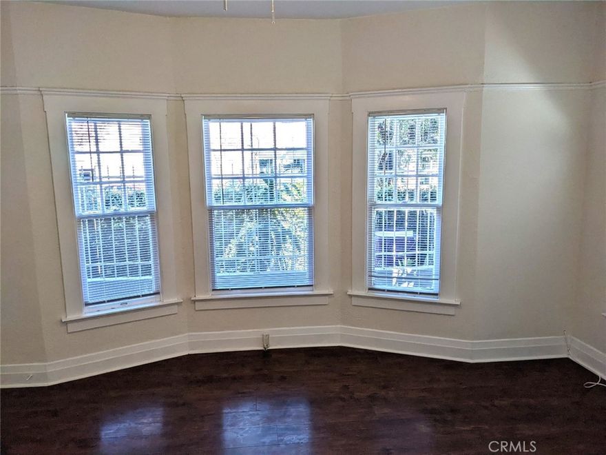 This is a cozy ground-level 1-bedroom unit in the heart of Long Beach's downtown area! Wood laminate flooring in the living room and bedroom; laminate flooring in the kitchen and bathroom. Plenty of storage and closet space. Refrigerator and range stove included. No on-site parking or laundry facilities, but there is a laundromat right across the street. Only a short distance to the ocean, wonderful shopping, restaurants, parks & excellent coffee shops. Small pets okay. Service animals are welcome. Landlords pay for water & trash. Call, text, or email me to schedule a viewing.